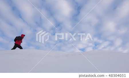 teamwork people in difficult conditions. climbers team in winter go to top of the mountain teamwork people in difficult conditions. climbers team in winter go to top of the mountain 48304031