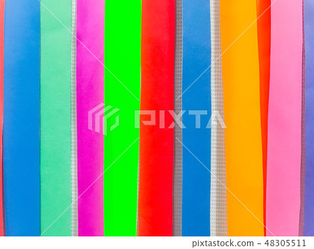 Colored paper strips decorate on board 48305511