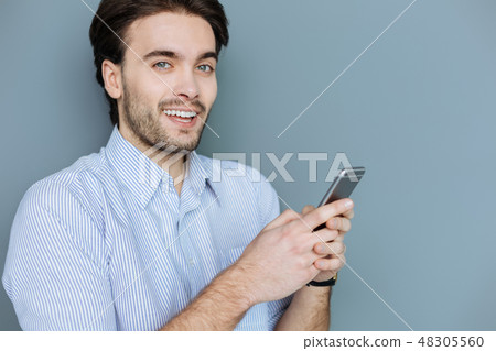 Attractive bearded man chatting online 48305560