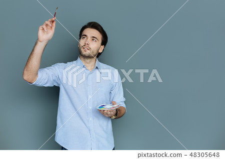 Nice creative man painting Nice creative man painting 48305648