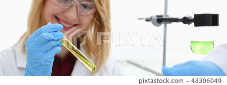 Technician hold in arms in protective gloves 48306049