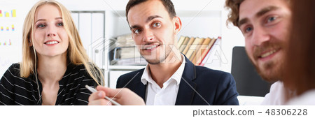 Group of people hold silver pen ready to make Group of people hold silver pen ready to make 48306228