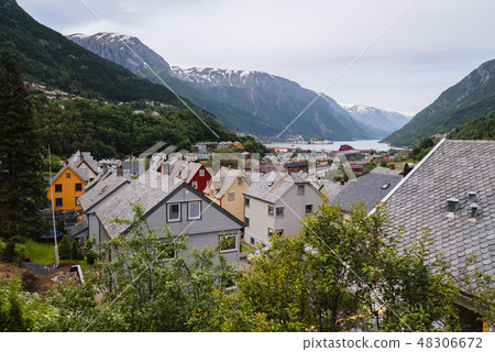 Norwegian village in a mountain valley Norwegian village in a mountain valley 48306672