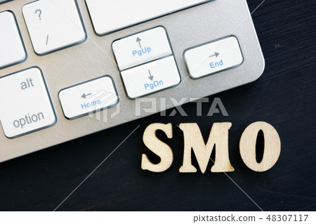 SMO Social Media Optimization on a desk. SMO Social Media Optimization on a desk. 48307117