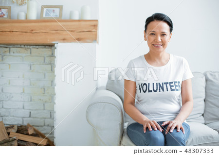 Happy female volunteer encouraging for work Happy female volunteer encouraging for work 48307333