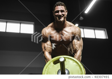 Handsome strong athletic men muscles workout Handsome strong athletic men muscles workout 48307491