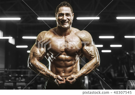 Handsome strong athletic men muscles workout Handsome strong athletic men muscles workout 48307545