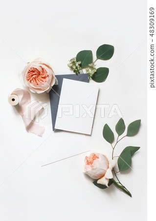 Feminine wedding, birthday mock-up scene. Blank paper greeting cards, envelope, silk ribbon 48309169