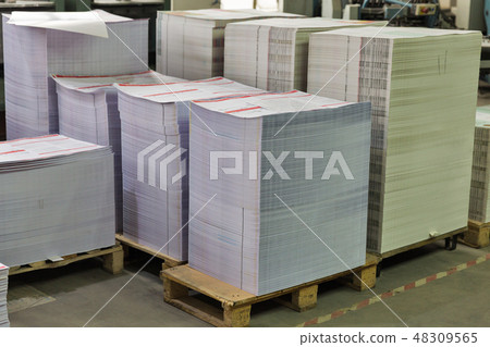 many sheets of white printed paper closeup many sheets of white printed paper closeup 48309565