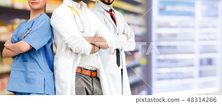 Doctor working in hospital with other doctors. Doctor working in hospital with other doctors. 48314266