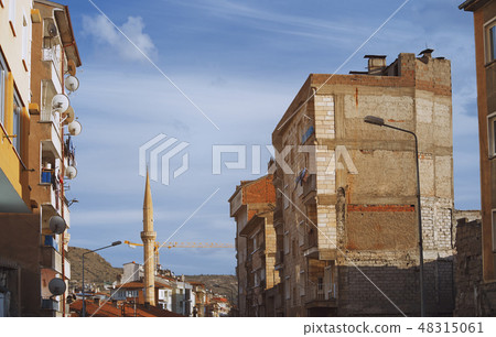 Goreme town with mosque and residential buildings Goreme town with mosque and residential buildings 48315061