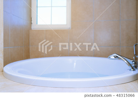 Modern bathtub full of water 48315066