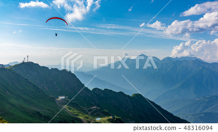 Glider in blue cloudy sky over the Green Mountain Glider in blue cloudy sky over the Green Mountain 48316094