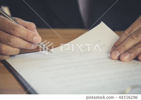 Businessman or accountant working on calculator to Businessman or accountant working on calculator to 48316296