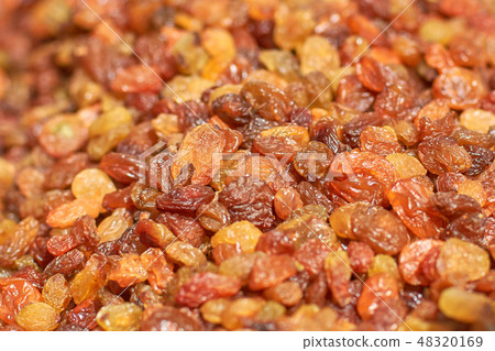 raisins, dried grapes, closeup texture background raisins, dried grapes, closeup texture background 48320169