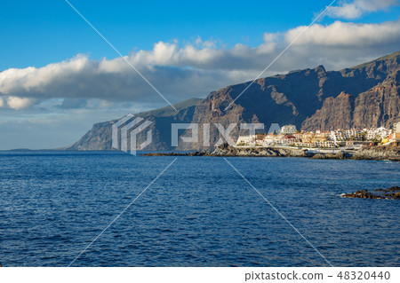 Los Gigantes cliffs and buildings in Tenerife Los Gigantes cliffs and buildings in Tenerife 48320440