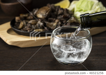 Shochu and local chicken baked Shochu and local chicken baked 48321256