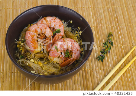 Glass noodles with sauce and shrimps, asian cuisine. Glass noodles with sauce and shrimps, asian cuisine. 48321425