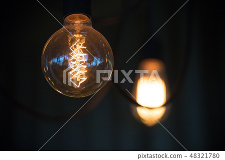 Garland bulbs in the dark, the interior of the cafe Garland bulbs in the dark, the interior of the cafe 48321780