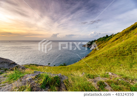 Green hill with horizon sea on coastline Green hill with horizon sea on coastline 48324350