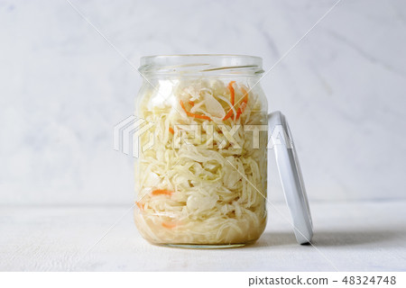 Glass jar of fermented prepared cabbage 48324748