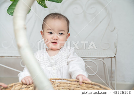 Baby standing up Baby standing up 48326198