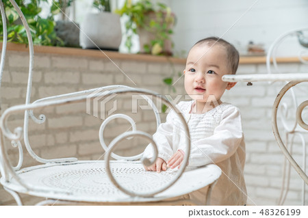 Baby standing up Baby standing up 48326199