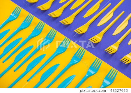 Colorful set of plastic table ware isolated on background Colorful set of plastic table ware isolated on background 48327653