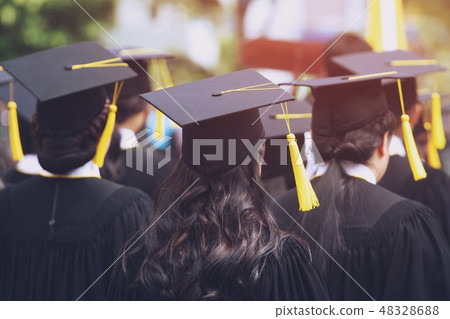 shot of graduation hats during commencement  48328688