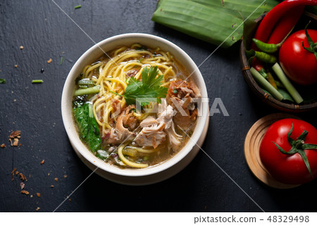 Soup noodles in bowl 48329498