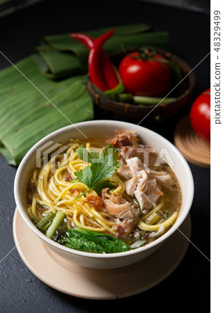 Soup noodles in bowl 48329499