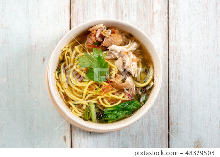 Soup noodles in bowl 48329503