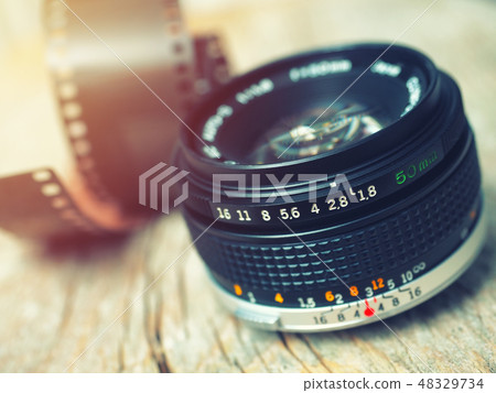 Close up photo of old camera lens 48329734