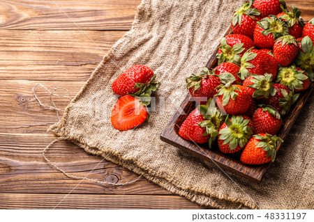 Bowl with fresh strawberries 48331197