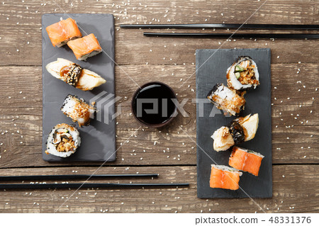 Japanese seafood sushi , rolls 48331376