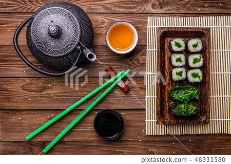 Photo of rolls, sticks, sauce Photo of rolls, sticks, sauce 48331580