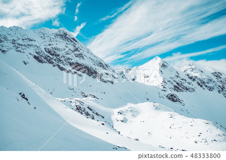 Spectacular landscape of snowy mountains in winter Spectacular landscape of snowy mountains in winter 48333800