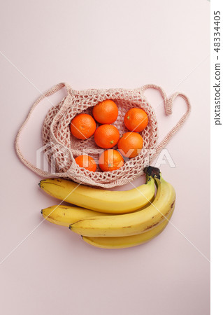 fruits tangerine, banana in recycling net market fruits tangerine, banana in recycling net market 48334405