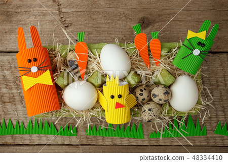 Easter holiday concept with eggs, cute handmade Easter holiday concept with eggs, cute handmade 48334410