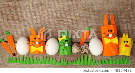 Easter eggs, rabbits and chikens on wood vintage Easter eggs, rabbits and chikens on wood vintage 48334481