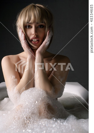 Nude blonde in bath portrait Nude blonde in bath portrait 48334685
