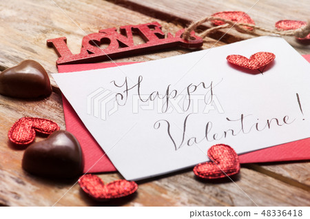 Happy valentine composition with chocolates hearts Happy valentine composition with chocolates hearts 48336418