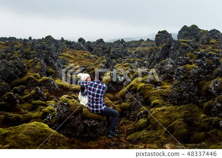 Couple hugging in a lava field in Iceland 48337446