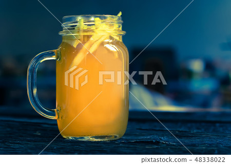Close up glass jar with delicious healthy apple punch Close up glass jar with delicious healthy apple punch 48338022