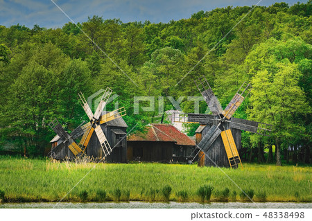 Windmills on the Bank of Lake 48338498