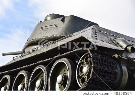 Soviet russian military old tank on blue sky Soviet russian military old tank on blue sky 48338594