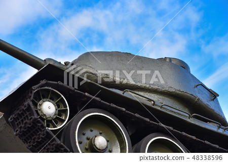 Soviet russian military old tank on blue sky Soviet russian military old tank on blue sky 48338596