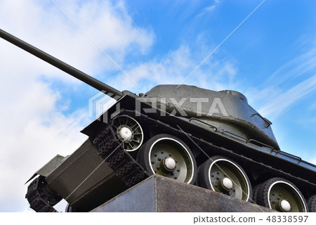 Soviet russian military old tank on a pedestal Soviet russian military old tank on a pedestal 48338597