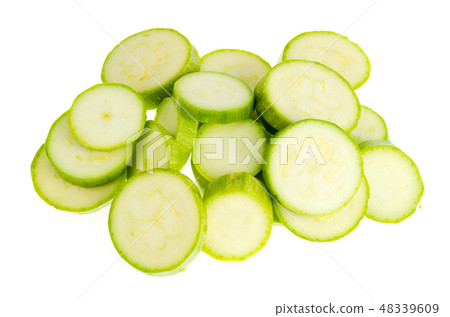 Young fresh green zucchini sliced. Young fresh green zucchini sliced. 48339609