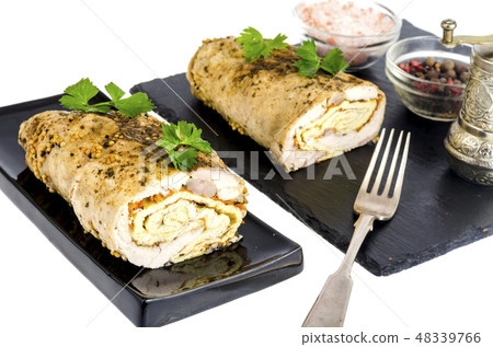 Chicken meat rolls with egg pancakes and carrots.  Chicken meat rolls with egg pancakes and carrots.  48339766